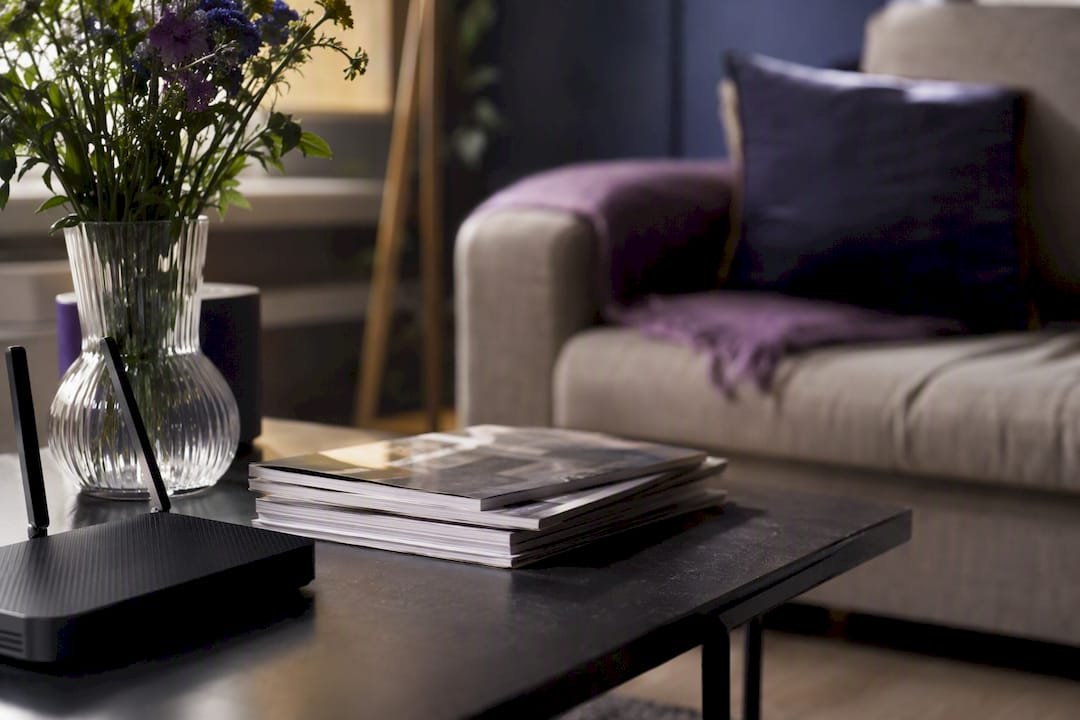 Router centrally placed on shelf in living room