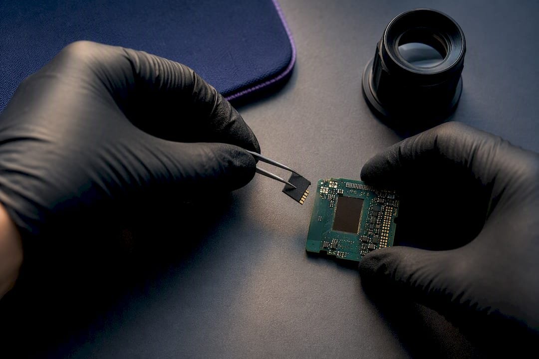 Technician performing chip-off data recovery